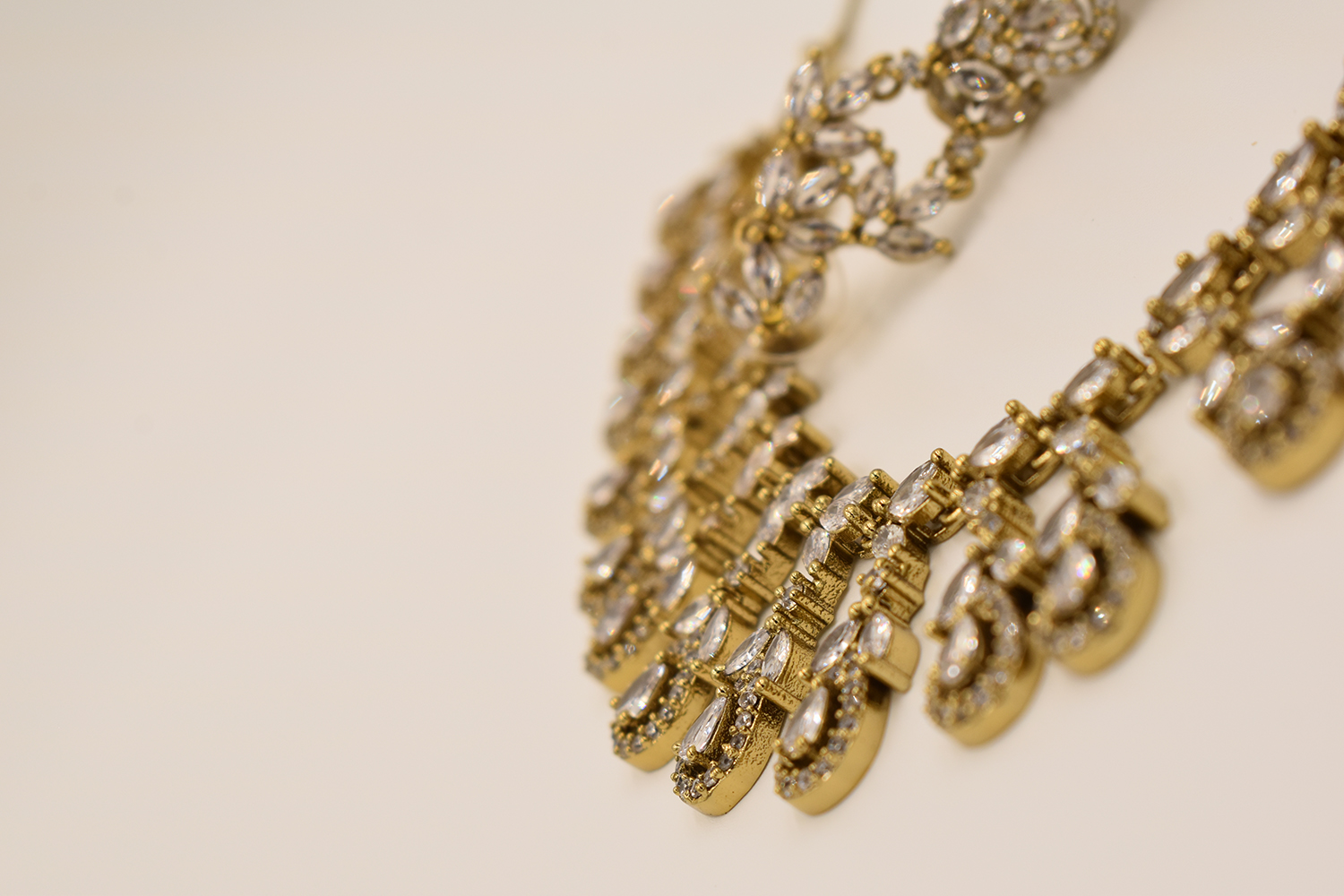 Temple necklace on stand